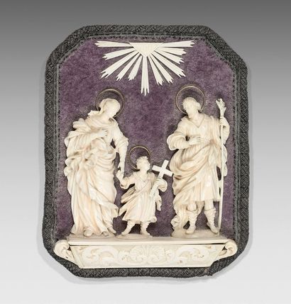 null Representation of the Holy Family in finely carved and gilded ivory; the Virgin...