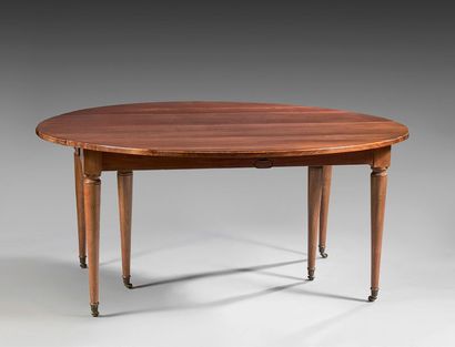null Mahogany dining room table. Shuttered top and median opening. Tapered legs with...