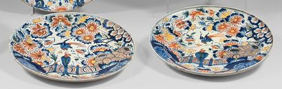 DELFT Two earthenware plates with polychrome decoration of parrots, one of which...