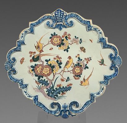 DELFT Oval earthenware wall plaque surrounded by foliage and shells with polychrome...