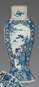 DELFT Two vases, a cup and a lid in earthenware with blue monochrome decoration....