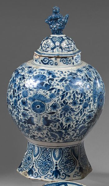 DELFT Covered octagonal earthenware vase with blue monochrome decoration of peacocks...