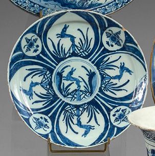 DELFT Earthenware plate decorated in blue monochrome of hares jumping over barriers...