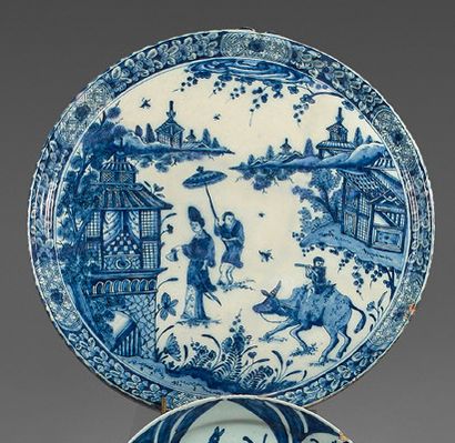 DELFT Circular earthenware tray with blue monochrome decoration of woman, child,...