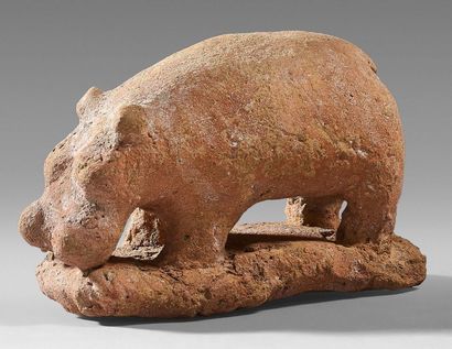 Hippopotamus figurine. The massive body,...
