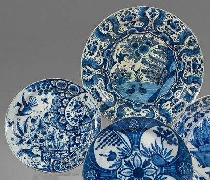 DELFT Two earthenware dishes with blue monochrome decoration.
The first one decorated...