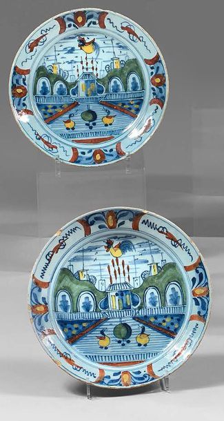 DELFT Pair of plates and pair of earthenware cups with polychrome decoration on a...