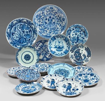 DELFT Two pairs of blue cameo earthenware plates, one decorated with a radiant floral...