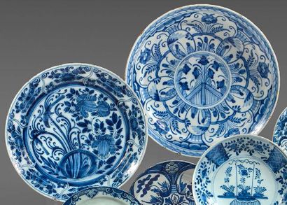 DELFT Two blue monochrome earthenware dishes with floral decoration, one decorated...