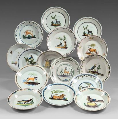 NEVERS Set of fifteen earthenware plates with contoured rim with various animal decorations...