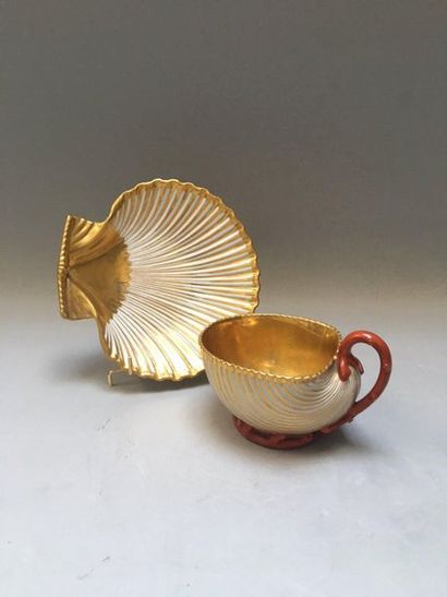  Attributed to the Manufacture de DAGOTY in PARIS: porcelain cup and saucer, the...