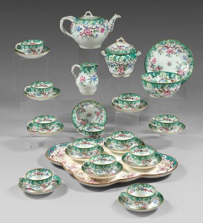 MINTON Porcelain tea service with polychrome decoration with a green background decorated...