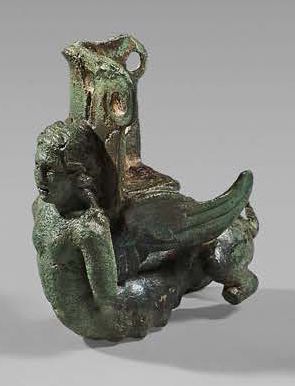 null Furniture leg in the shape of a winged sphinx.
Bronze and silver inlay.
France,...