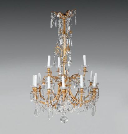 null Chandelier in gilt bronze and cut crystal, with eighteen arms of light on two...