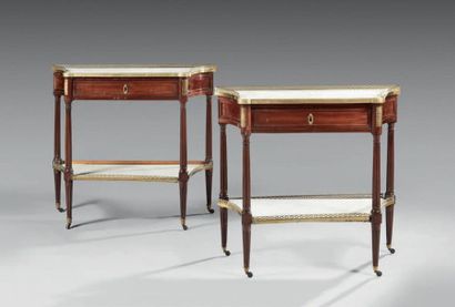 null Two consoles forming a pair in mahogany and mahogany veneer, chased and gilded...