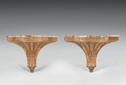 null Pair of carved and gilded wooden consoles with a frieze of laurel in belt, top...