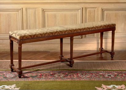 null Moulded and carved wooden bench resting on tapered fluted and roughened legs...