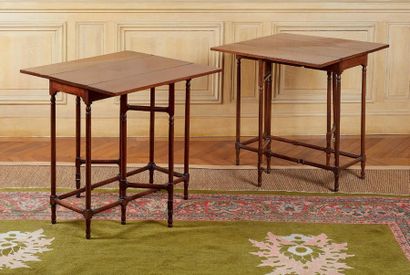 null Pair of mahogany flap tables, the rectangular top with two flaps resting on...