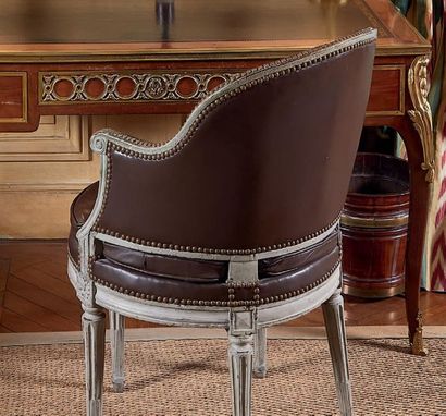 null Office armchair in pearl grey lacquered wood, moulded and carved, the four legs...