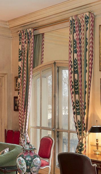 null Two pairs of curtains with a beige background decorated with stylized foliage...