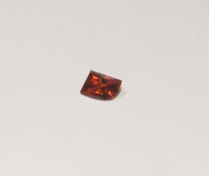 null A faceted spessartite garnet in a fancy shape. Weight: about 1.06 carat. 