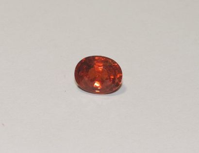 null A faceted spessartite garnet of oval shape. Dimensions: approx. 9.8 x 7.7 x...