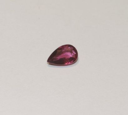 null A pear-shaped faceted rhodolite garnet. Dimensions: approx. 9.7 x 6.2 x 3.4...