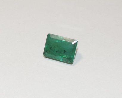 null A rectangular emerald with cut sides cut to degree. Dimensions: approx. 12.4...