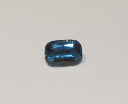 null A rectangular blue tourmaline with cutaway sides cut to degree. Dimensions:...