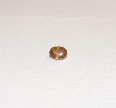 null A faceted yellow zirconia of oval shape. Dimensions: approx. 8.2 x 6.1 x 3.9...