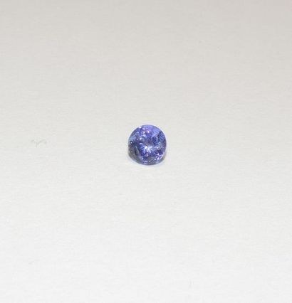 null A round faceted tanzanite. Dimensions: approx. 5.8 x 5.9 x 4.4 mm. Weight: approx....