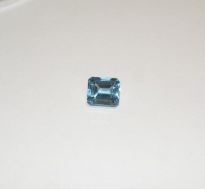 null Rectangular blue topaz with stepped cut edges. Dimensions: approx. 15 x 12.9...
