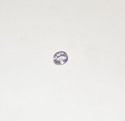 null A facetted pink sapphire of oval shape. Dimensions: approx. 6 x 5 x 2.6 mm....