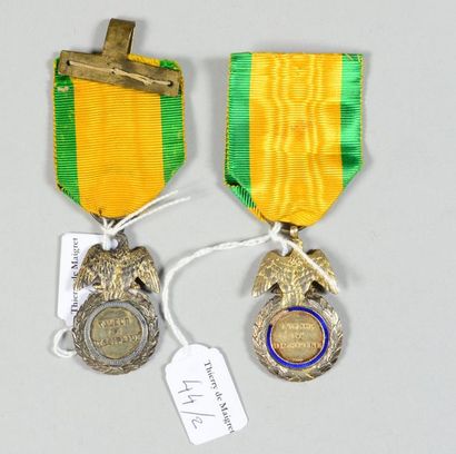 null Two military medals in silver and vermeil, enamelled, with their ribbon, one...