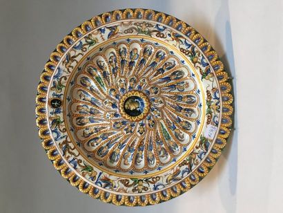 null In the style of Urbino. Large ceremonial dish decorated in polychrome with grotesques...