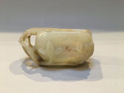 null Nephrite brush washer in the shape of a lotus leaf with carved decoration in...