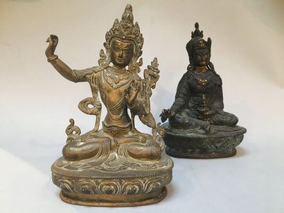 null Two Buddhas sitting in the lotus position 