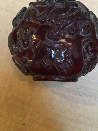 null Red glass flask carved on the outside with dragons and chimera

Radiance at...