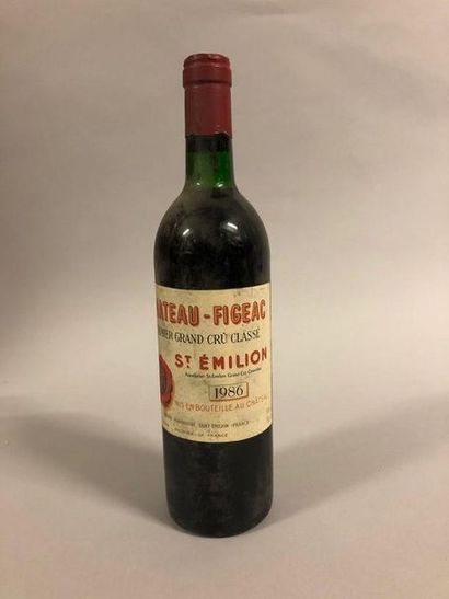 1 bouteille Château 	FIGEAC, 1° Grand Cru 	St-Émilion 	1986	 (es, elt, J) 