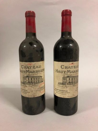 null 2 bouteilles CH. HAUT MARBUZET, Saint-Estèphe 2001 (es, ela) 