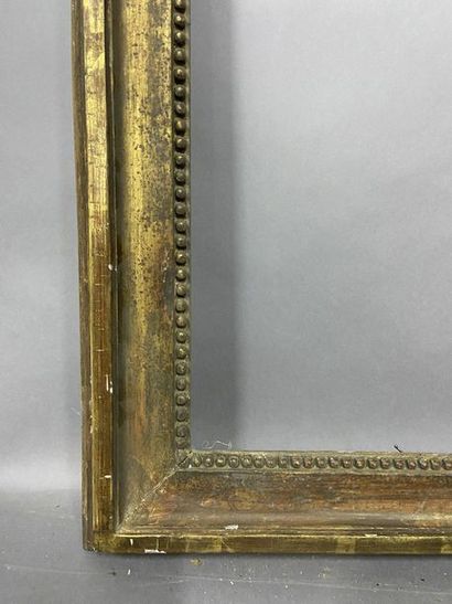 null Moulded oak frame, formerly gilded and decorated with pearl grape motifs

Louis...