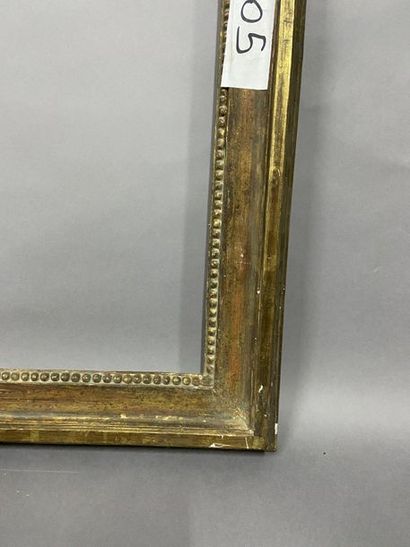 null Moulded oak frame, formerly gilded and decorated with pearl grape motifs

Louis...