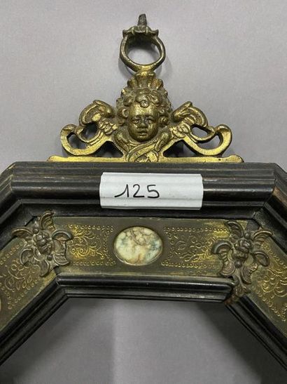 null Octagonal moulded and blackened wood frame decorated with gilded and openworked...