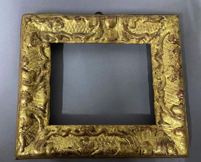 null Carved and gilded wood frame with Bérain decoration

Louis XIV period

11 x...