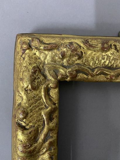 null Cadre en bois sculpté et doré à décor Bérain

Epoque Louis XIV

11 x 14 x 4...