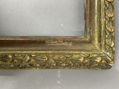 null Moulded wooden frame, formerly gilded with mecca, with an upside-down profile

Italy,...