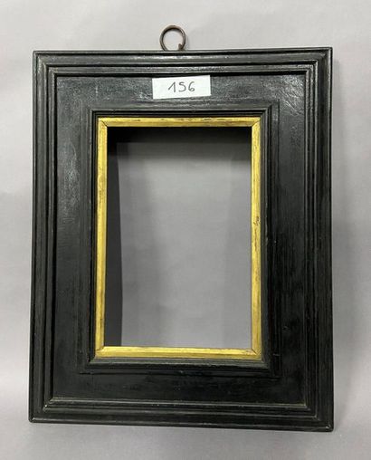 null Blackened moulded wooden frame with reversed profile and gold rabbets

Netherlands,...