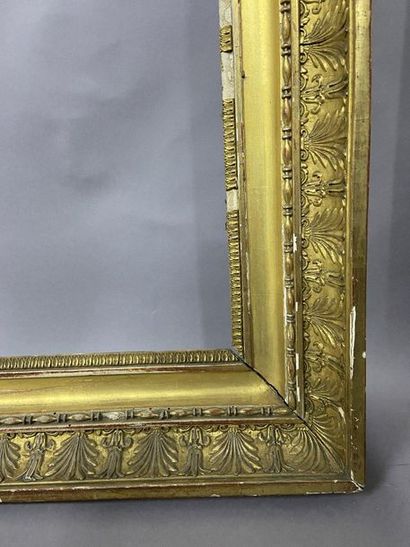 null Wooden frame and gilded paste known as ''à double gorge'' with palmette decoration....