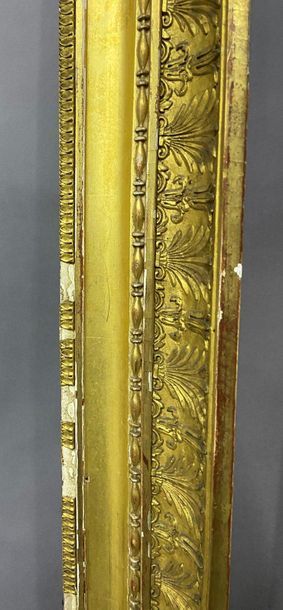 null Wooden frame and gilded paste known as ''à double gorge'' with palmette decoration....