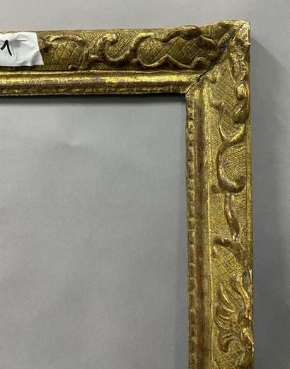 null Cadre en chêne sculpté et doré à décor Bérain

Epoque Louis XIV

37 x 45,5 x...